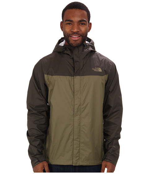 green and black north face jacket
